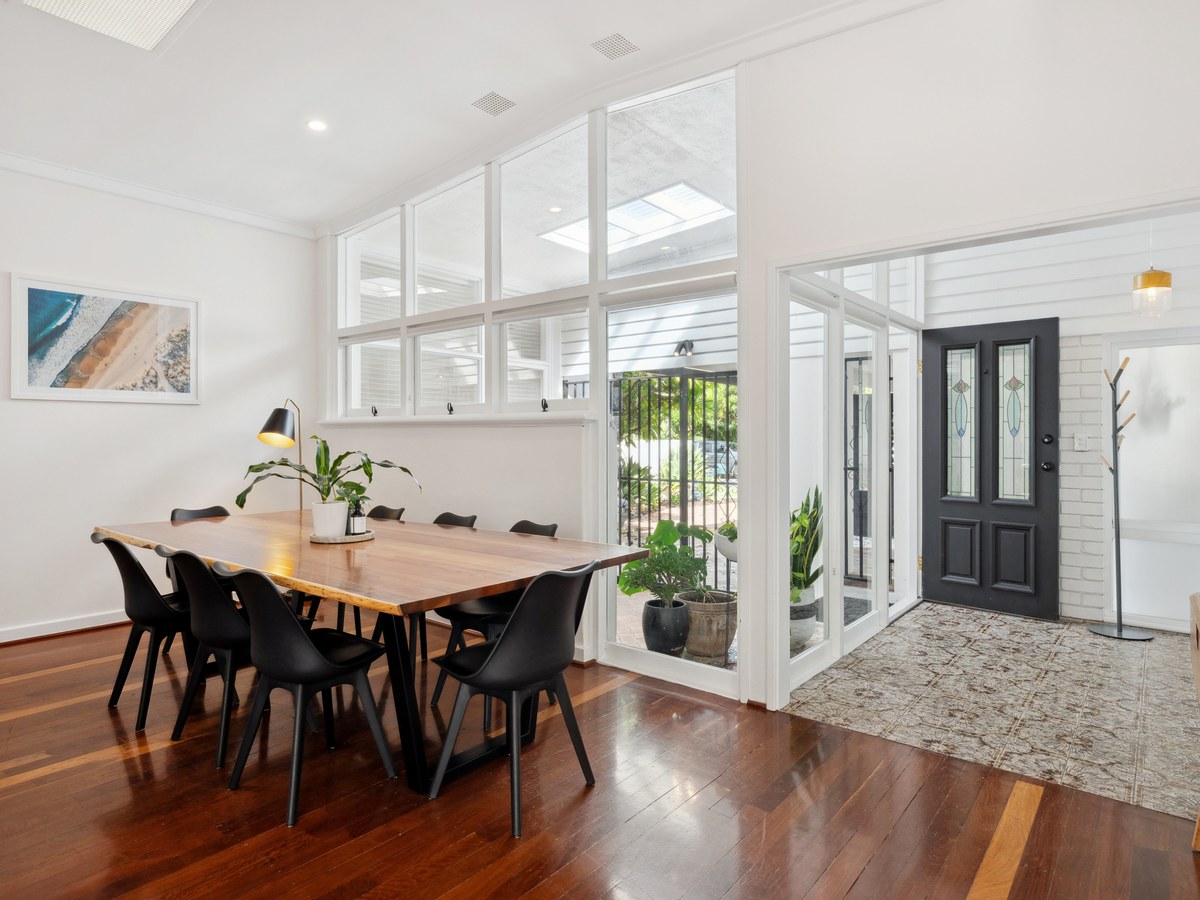 Bright open-plan dining area in a Scarborough beach house